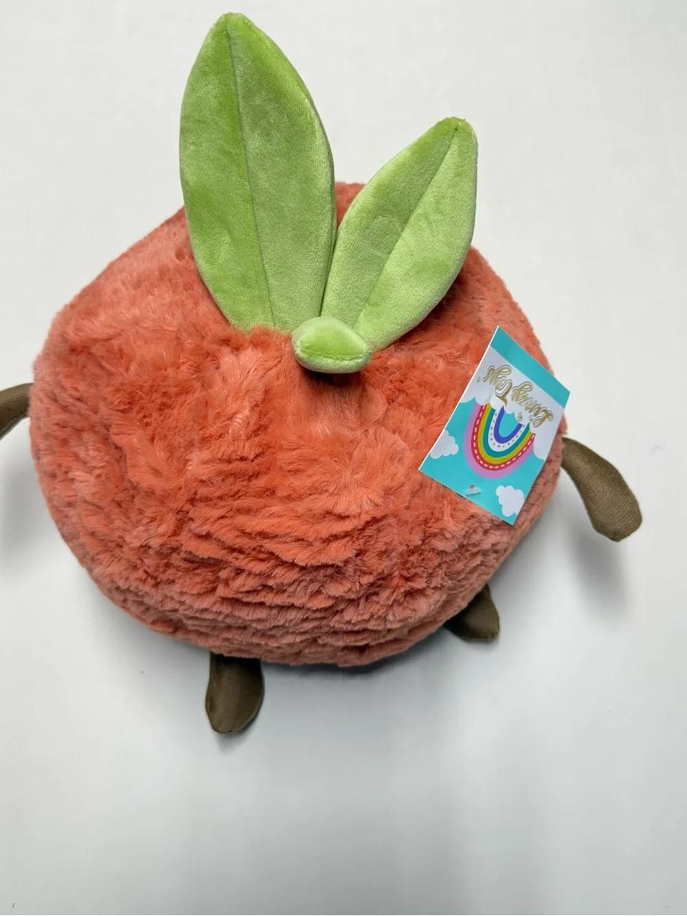 Plush Orange Fruit Character with Green Leaves